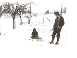 William Schrader pulling his niece, Jacque Zierenberg, on Olive Street Rd by Hog Hollow Rd. Courtesy of Herbert & Lillian Zierenberg.
